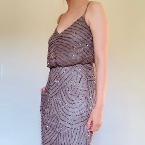 Cache formal dress in taupe.